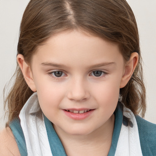 Joyful white child female with medium  brown hair and grey eyes