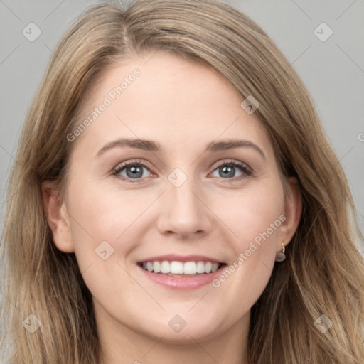 Joyful white young-adult female with long  brown hair and grey eyes