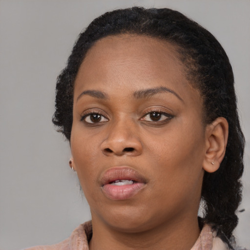 Neutral black young-adult female with medium  black hair and brown eyes