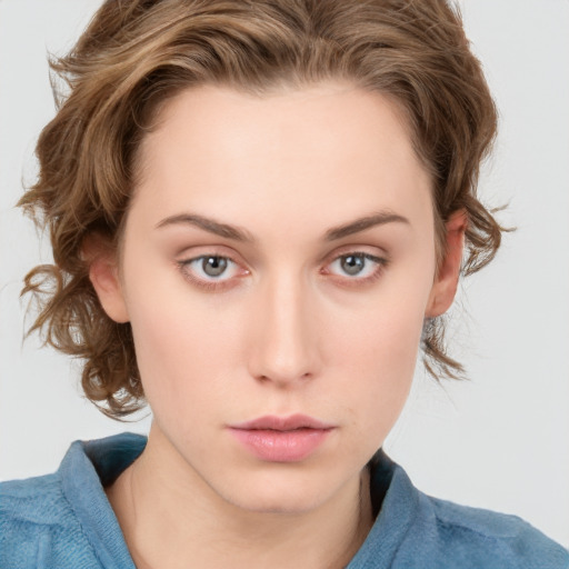 Neutral white young-adult female with medium  brown hair and blue eyes