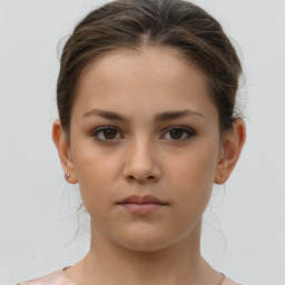 Neutral white young-adult female with medium  brown hair and brown eyes