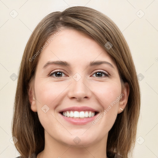 Joyful white young-adult female with medium  brown hair and green eyes