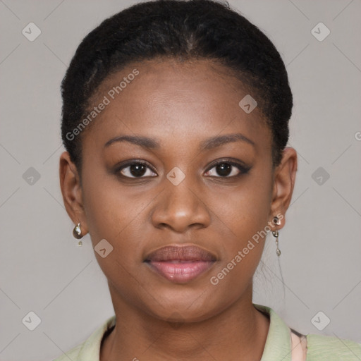 Joyful black young-adult female with short  brown hair and brown eyes