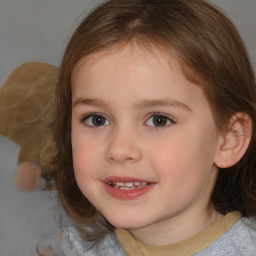 Joyful white child female with medium  brown hair and brown eyes