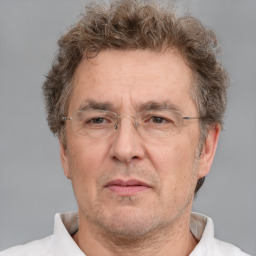 Neutral white middle-aged male with short  brown hair and brown eyes