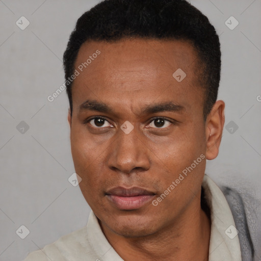 Neutral black young-adult male with short  black hair and brown eyes