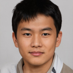 Neutral asian young-adult male with short  brown hair and brown eyes