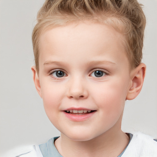 Joyful white child female with short  brown hair and brown eyes