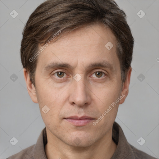 Neutral white adult male with short  brown hair and grey eyes