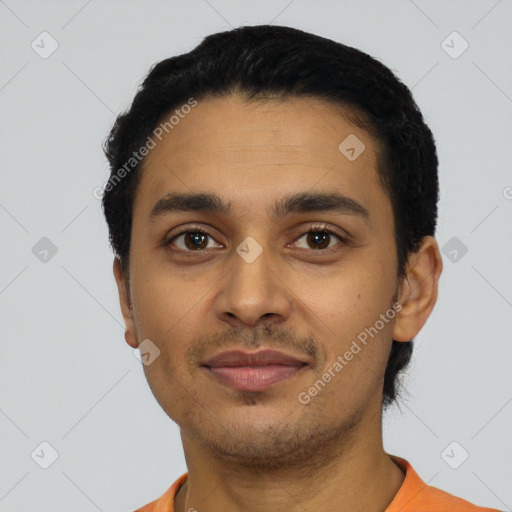 Joyful latino young-adult male with short  black hair and brown eyes