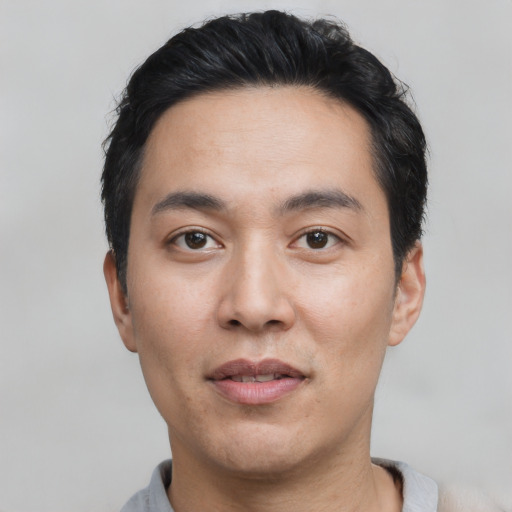 Neutral asian young-adult male with short  black hair and brown eyes