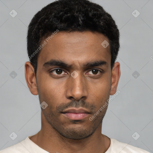 Neutral latino young-adult male with short  black hair and brown eyes