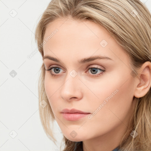 Neutral white young-adult female with long  brown hair and grey eyes