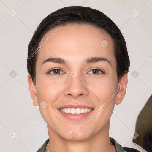 Joyful white young-adult female with short  brown hair and brown eyes