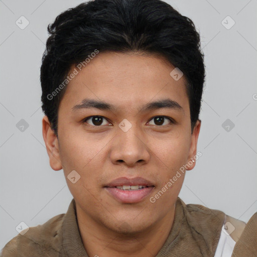 Joyful asian young-adult male with short  brown hair and brown eyes