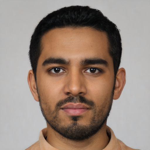Neutral latino young-adult male with short  black hair and brown eyes