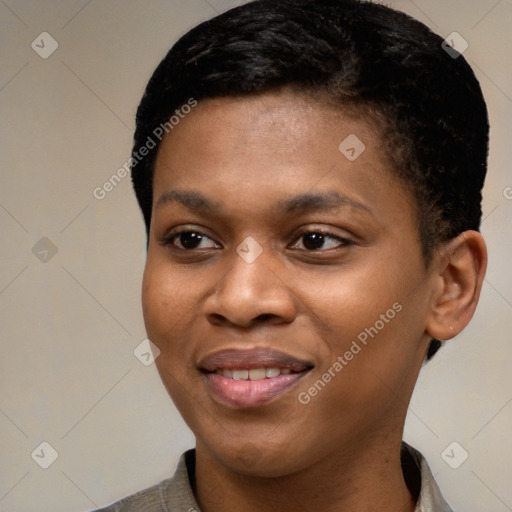 Joyful black young-adult female with short  black hair and brown eyes