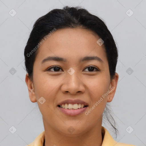 Joyful asian young-adult female with short  brown hair and brown eyes