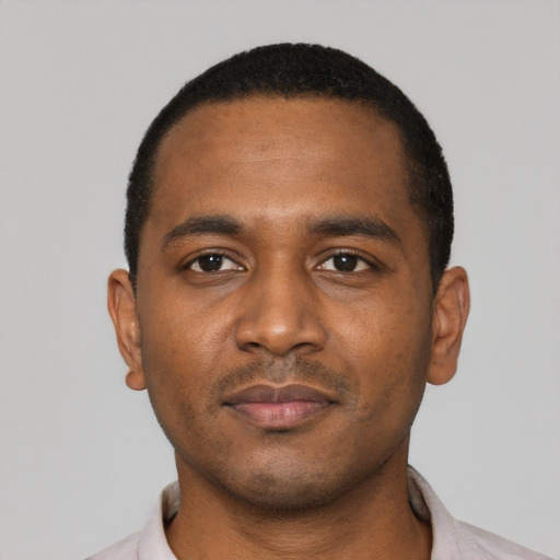 Neutral black young-adult male with short  black hair and brown eyes