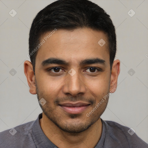 Joyful latino young-adult male with short  black hair and brown eyes