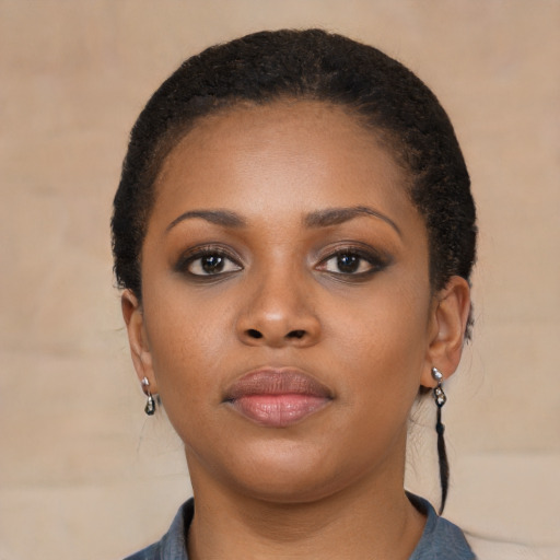 Neutral black young-adult female with short  brown hair and brown eyes