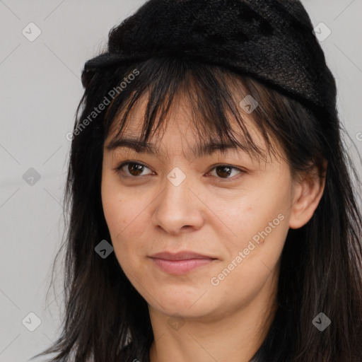 Joyful asian young-adult female with long  brown hair and brown eyes