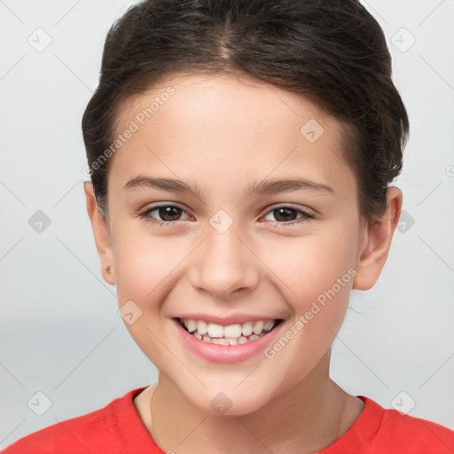 Joyful white child female with short  brown hair and brown eyes