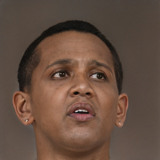 Neutral black adult male with short  brown hair and brown eyes