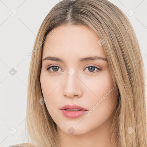 Neutral white young-adult female with long  brown hair and brown eyes