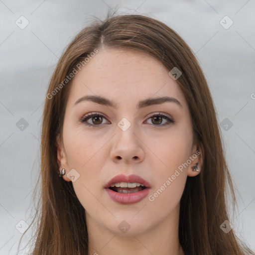 Neutral white young-adult female with long  brown hair and brown eyes