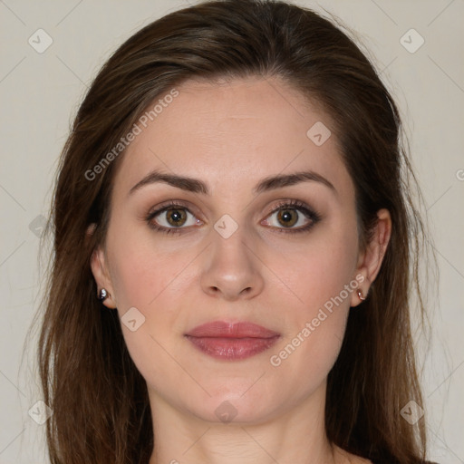 Joyful white young-adult female with long  brown hair and green eyes