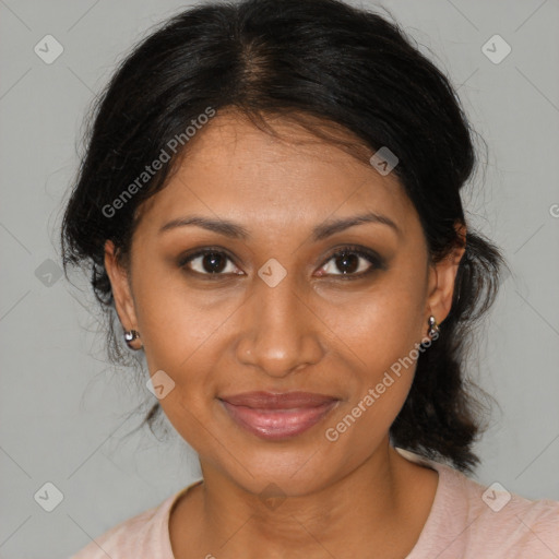 Joyful black young-adult female with medium  brown hair and brown eyes