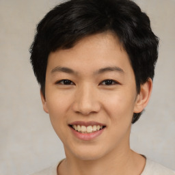 Joyful asian young-adult female with short  black hair and brown eyes