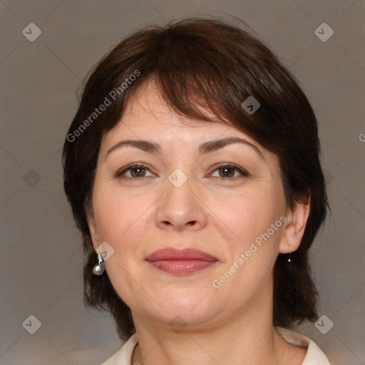 Joyful white adult female with medium  brown hair and brown eyes