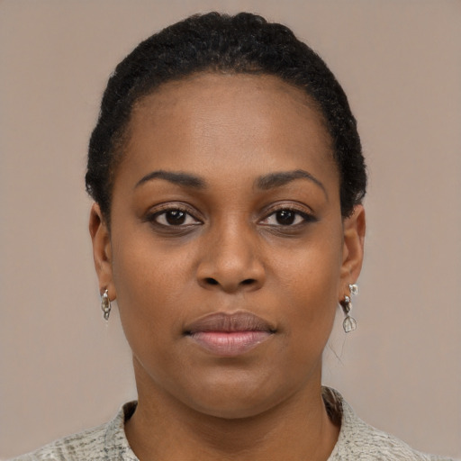Neutral black young-adult female with short  black hair and brown eyes