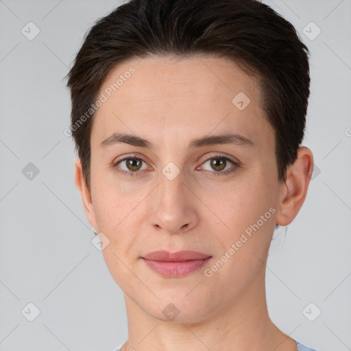 Joyful white young-adult female with short  brown hair and brown eyes