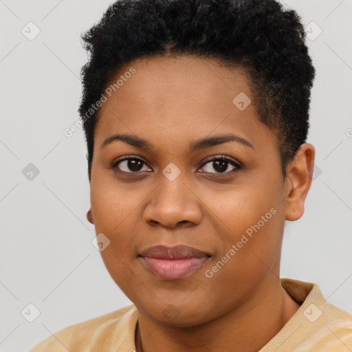 Joyful black young-adult female with short  black hair and brown eyes