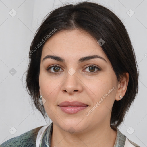 Joyful white young-adult female with medium  brown hair and brown eyes