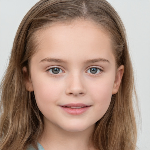 Joyful white child female with long  brown hair and grey eyes