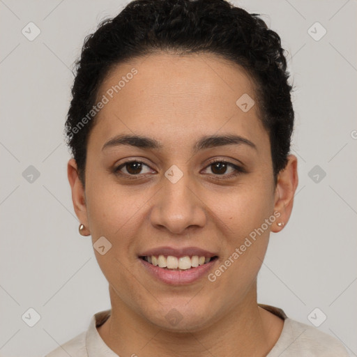 Joyful white young-adult female with short  brown hair and brown eyes