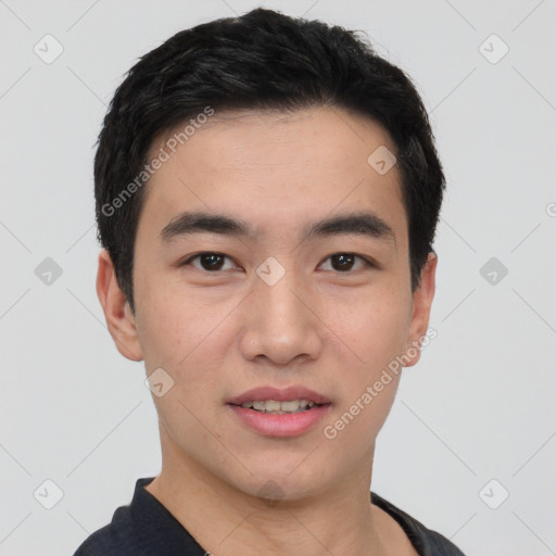 Joyful white young-adult male with short  black hair and brown eyes