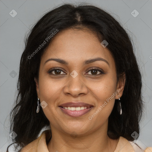 Joyful black young-adult female with long  brown hair and brown eyes