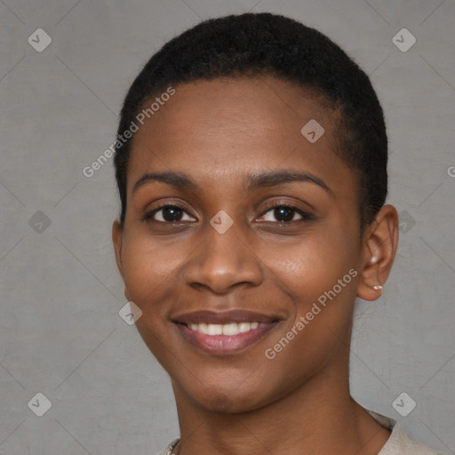 Joyful black young-adult female with short  brown hair and brown eyes