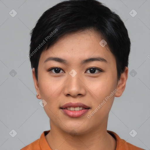 Joyful asian young-adult female with short  black hair and brown eyes