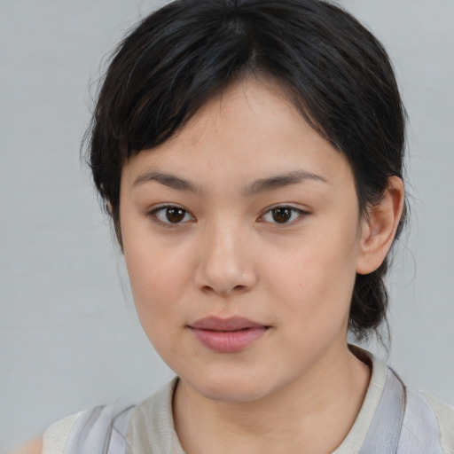 Neutral asian young-adult female with medium  brown hair and brown eyes