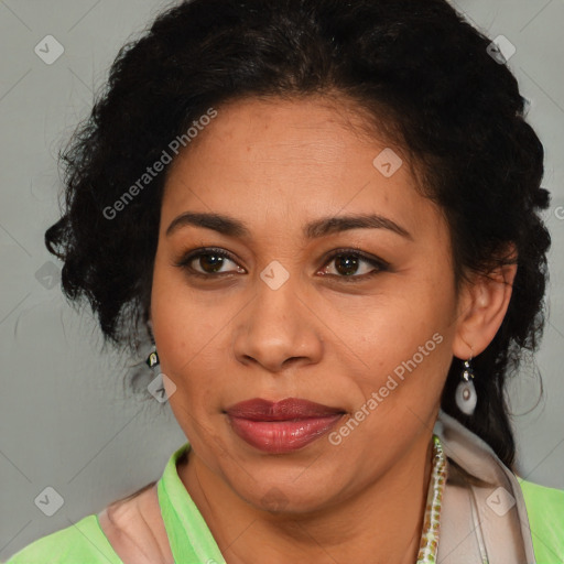 Joyful latino adult female with short  brown hair and brown eyes