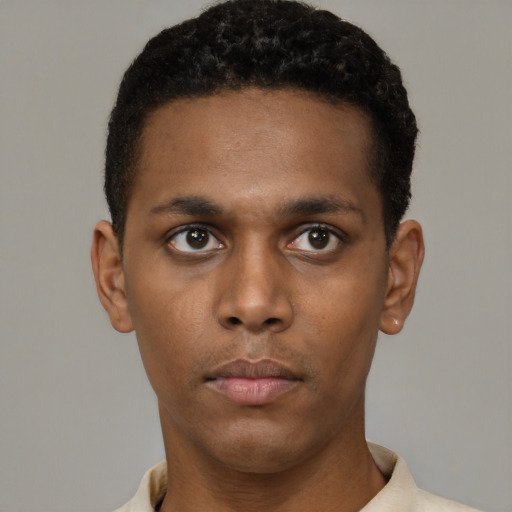 Neutral black young-adult male with short  black hair and brown eyes