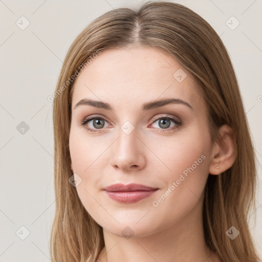 Joyful white young-adult female with long  brown hair and grey eyes