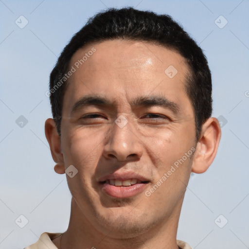 Joyful white adult male with short  black hair and brown eyes