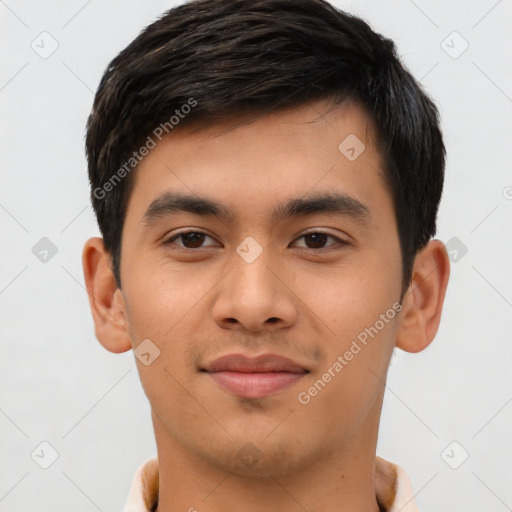 Joyful latino young-adult male with short  brown hair and brown eyes